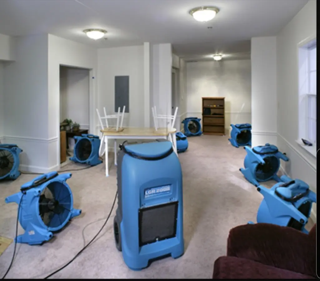 Air movers and dehumidifier setup for Water Damage Restoration in Connerton